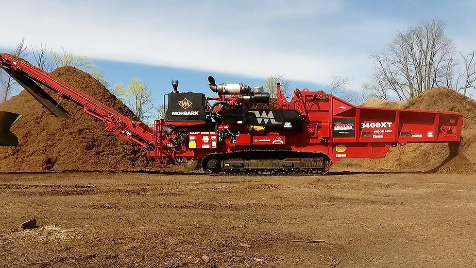 Horizontal Grinder processing wood waste on site | Four Brother' Land Clearing, LLC, Mobile Grinding Services 