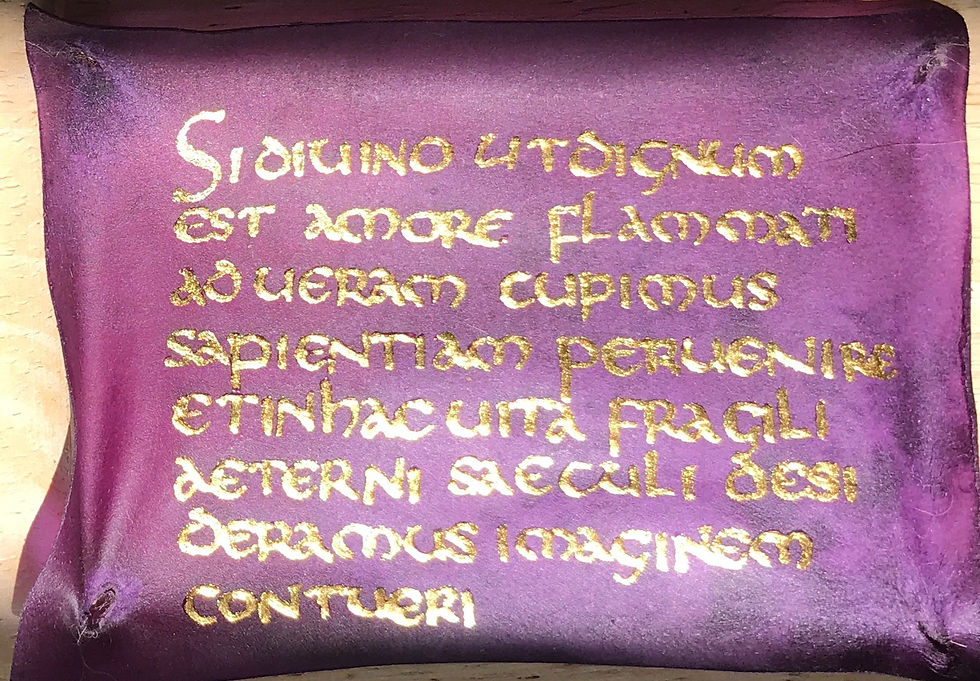 Purple parchment with gold lettering