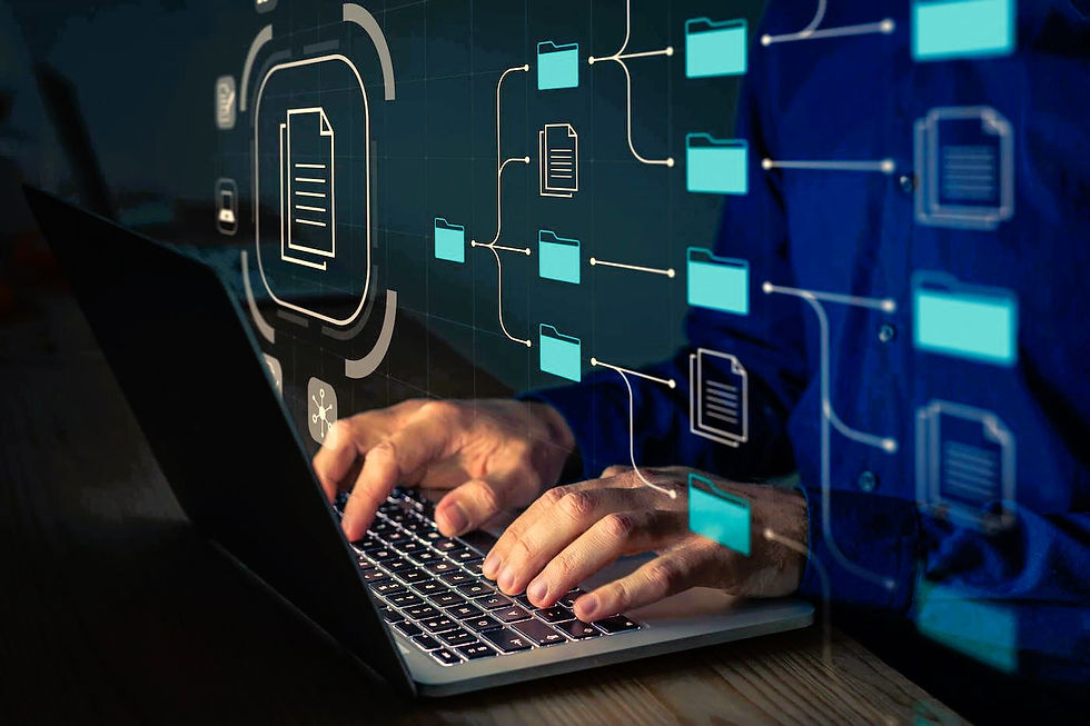 Hands type on a laptop with blue folders and digital file icons floating above, suggesting data management or digital organization.