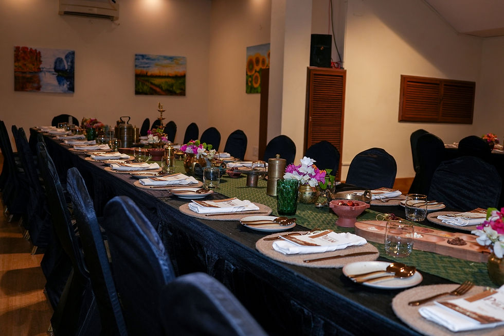 A beautifully set curated dining experience table at Hanu Reddy Residences Chennai with intimate lighting and chef plated courses
