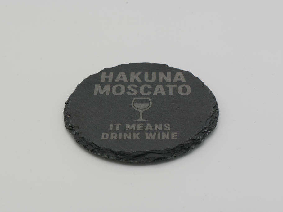 Round slate coaster with "HAKUNA MOSCATO IT MEANS DRINK WINE" printed 3dLaserStudio.