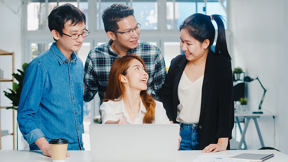 collaborative-process-multicultural-businesspeople-using-laptop-presentation-communication