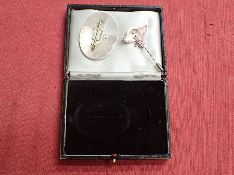 Thumbnail: Cased WW2 German 1938 NSFK badge with convex RZM-marked stick pin