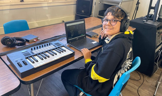 Justin's student working with a Novation Launchkey MK4 MIDI controller, connected to the Korg GEC5