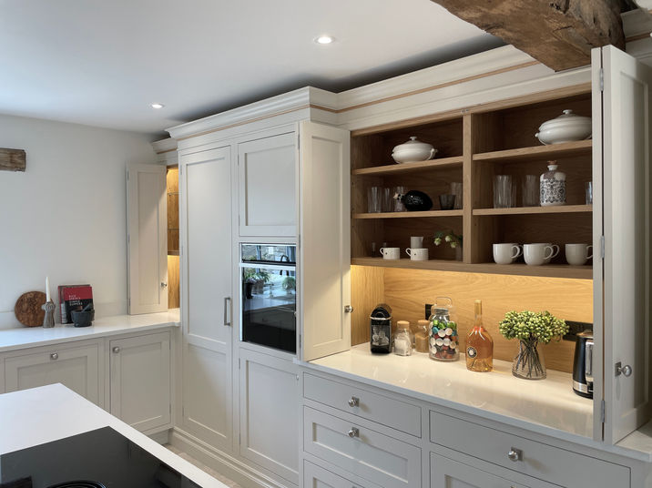 Handmade Inframe kitchen painted in Farrow and Ball Skimming Stone. Island painted in Charlestone Grey. 