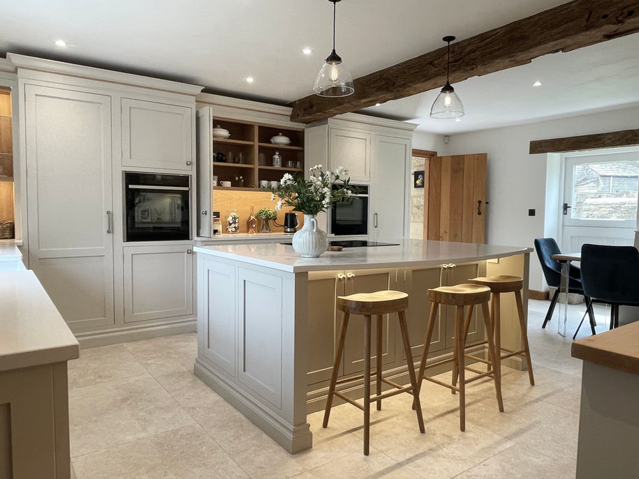 Handmade Inframe kitchen painted in Farrow and Ball Skimming Stone. Island painted in Charlestone Grey. 