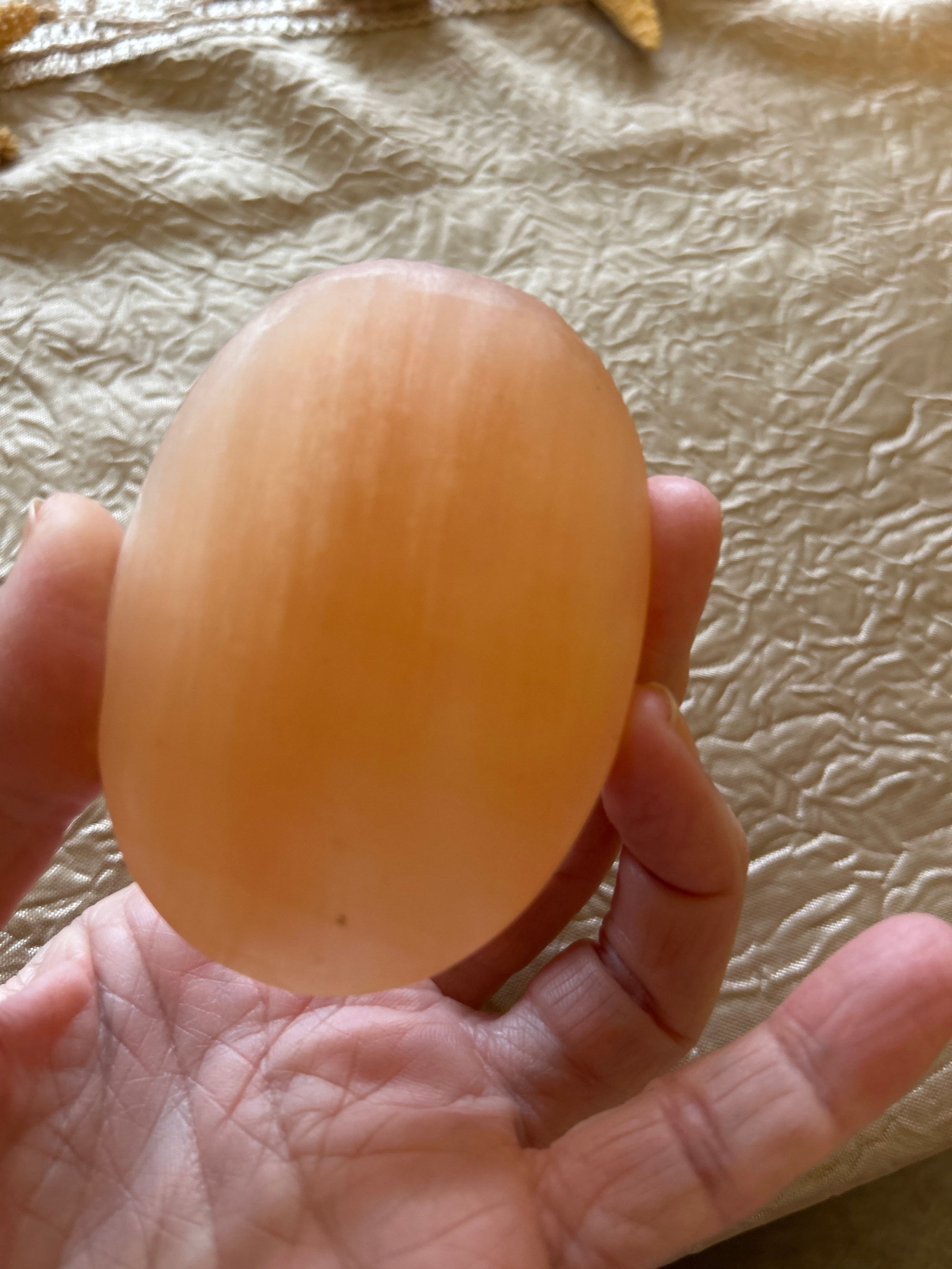 Peach Selenite Palmstone