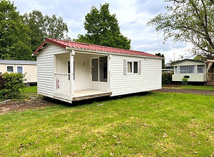 Mobil-home d’occasion à vendre au Camping Alaska à Marbehan avec terrasse et emplacement privatif dans un camping familial en Ardennes belges.
