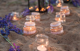 romantic-candle-decorations-with-purple-flowers-on-2026-01-08-05-28-19-utc.jpg