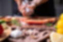 chef-prepares-pork-chop-steak-with-barbecue-sauce-2022-02-08-22-39-25-utc.jpg