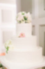 White and Blush Blooms on Cake