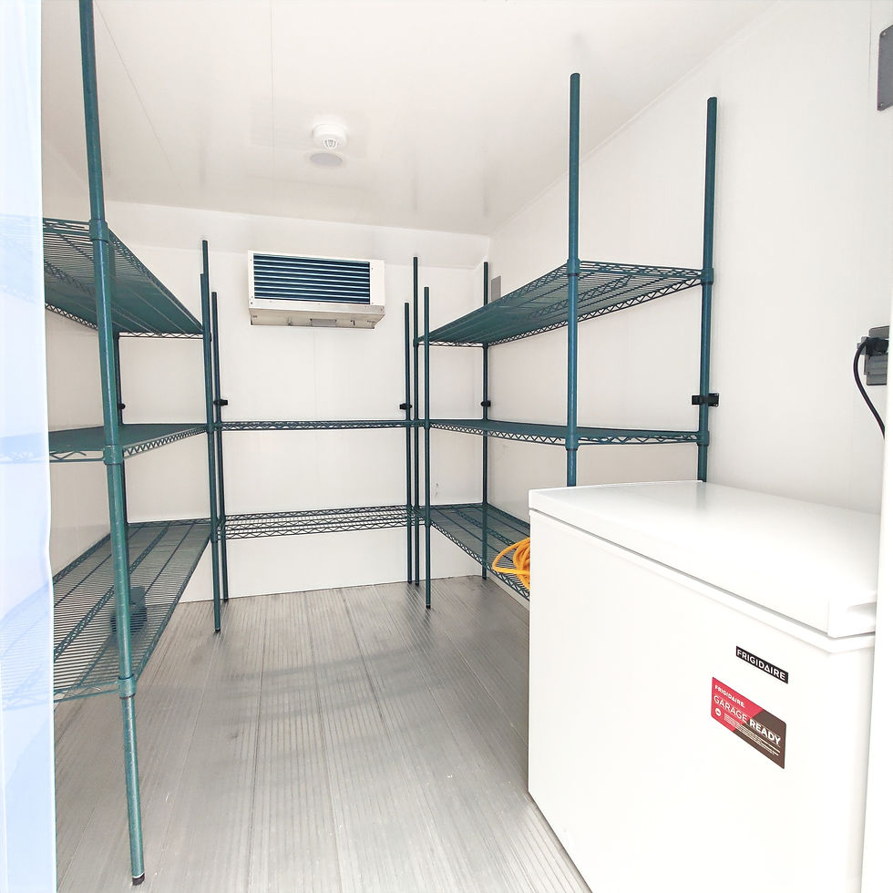 Close-up view of the interior of a refrigerated trailer showing shelves and cooling system