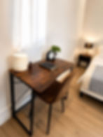 Dedicated workspace with desk and chair in a furnished studio for remote work and extended stays in West Hills, California.