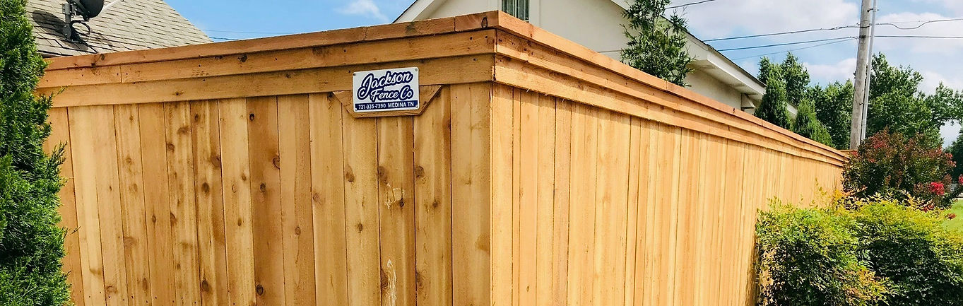 Capped Cedar Fence built on steel postmaster fence posts