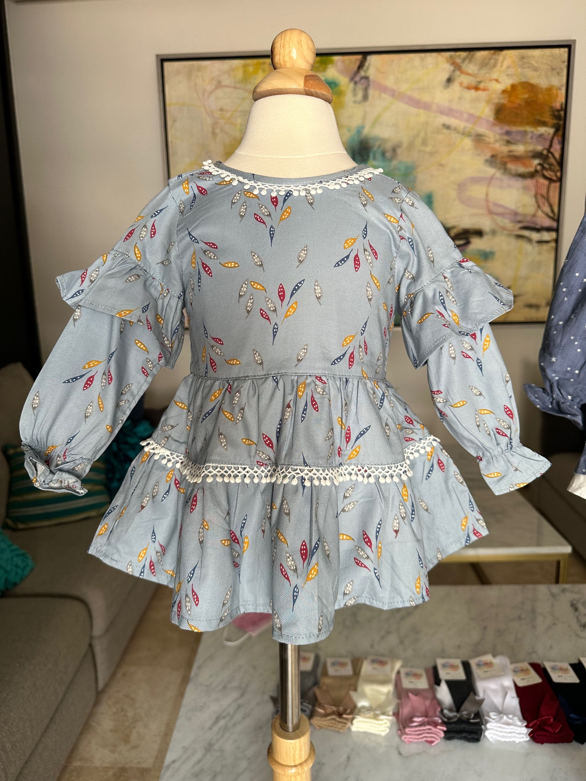 Vestido azul de bebé hojas