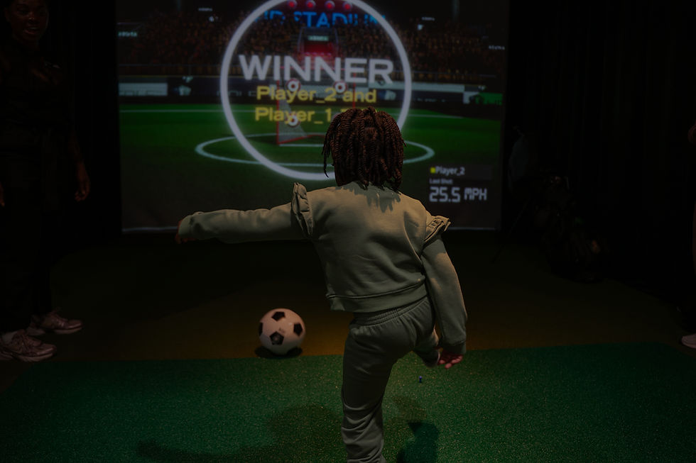 Child playing soccer at GOLF LINKS