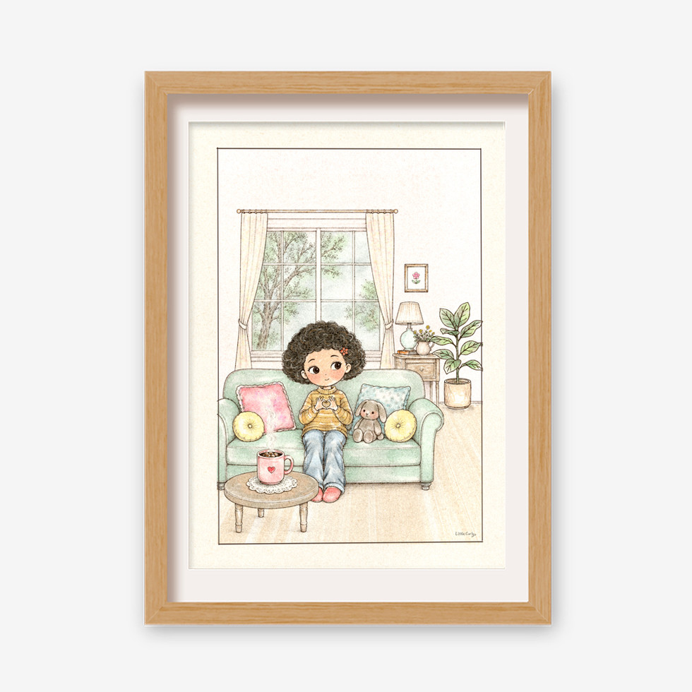 A Little Love story print displayed in a natural wooden frame.