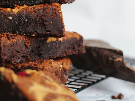 A plate of homemade chocolate brownies from Fiona’s famous Te Tahi Youth brownie recipe.