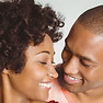 Smiling couple enjoying mental health counseling session at Integrative Psychology of North Carolina
