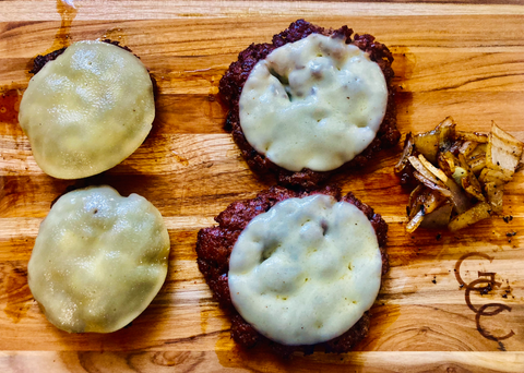 cooked hamburger patties with cheese