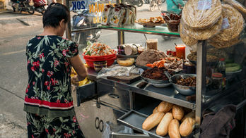 street vendor selling banh mi vietnam