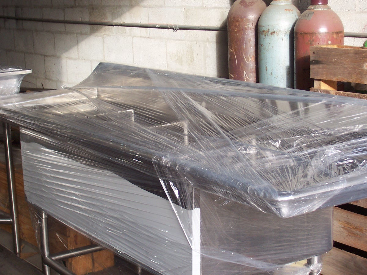 Stainless steel 3 compartment sink.