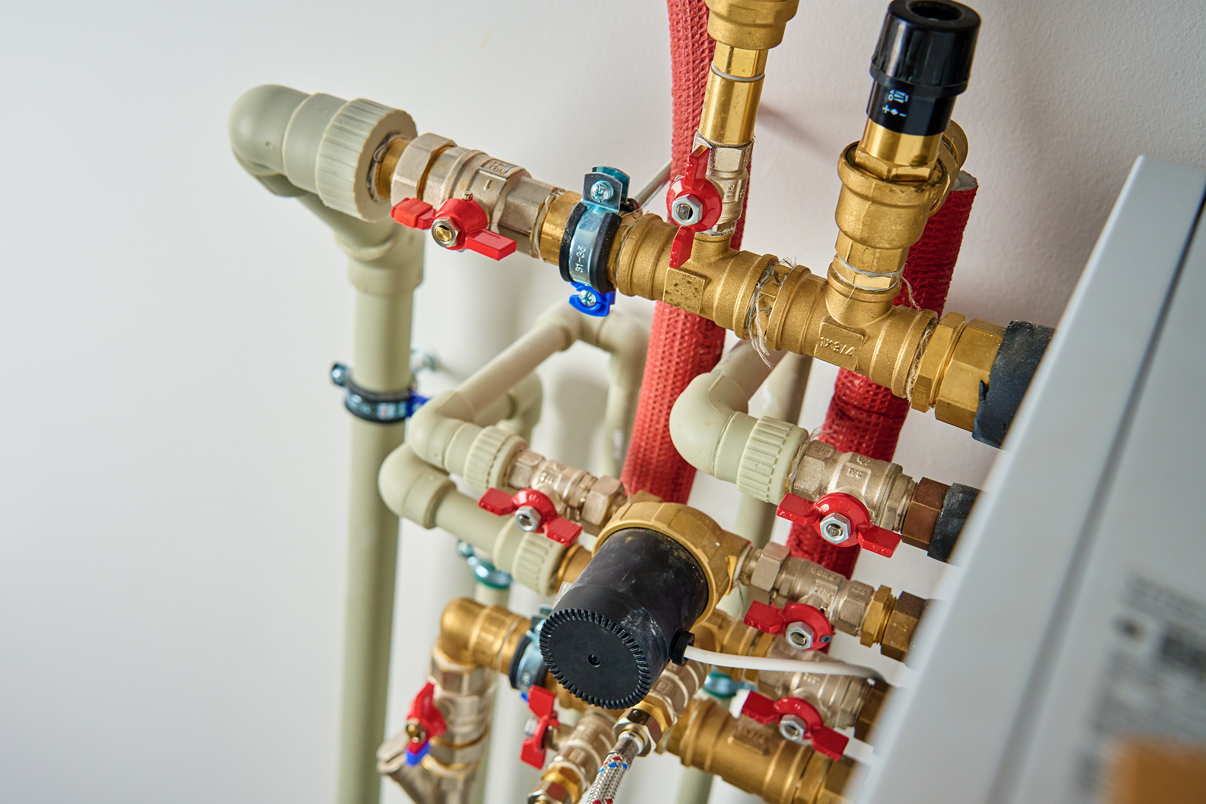 pipes-and-valves-plumbing-system-inside-a-home -sml.jpg