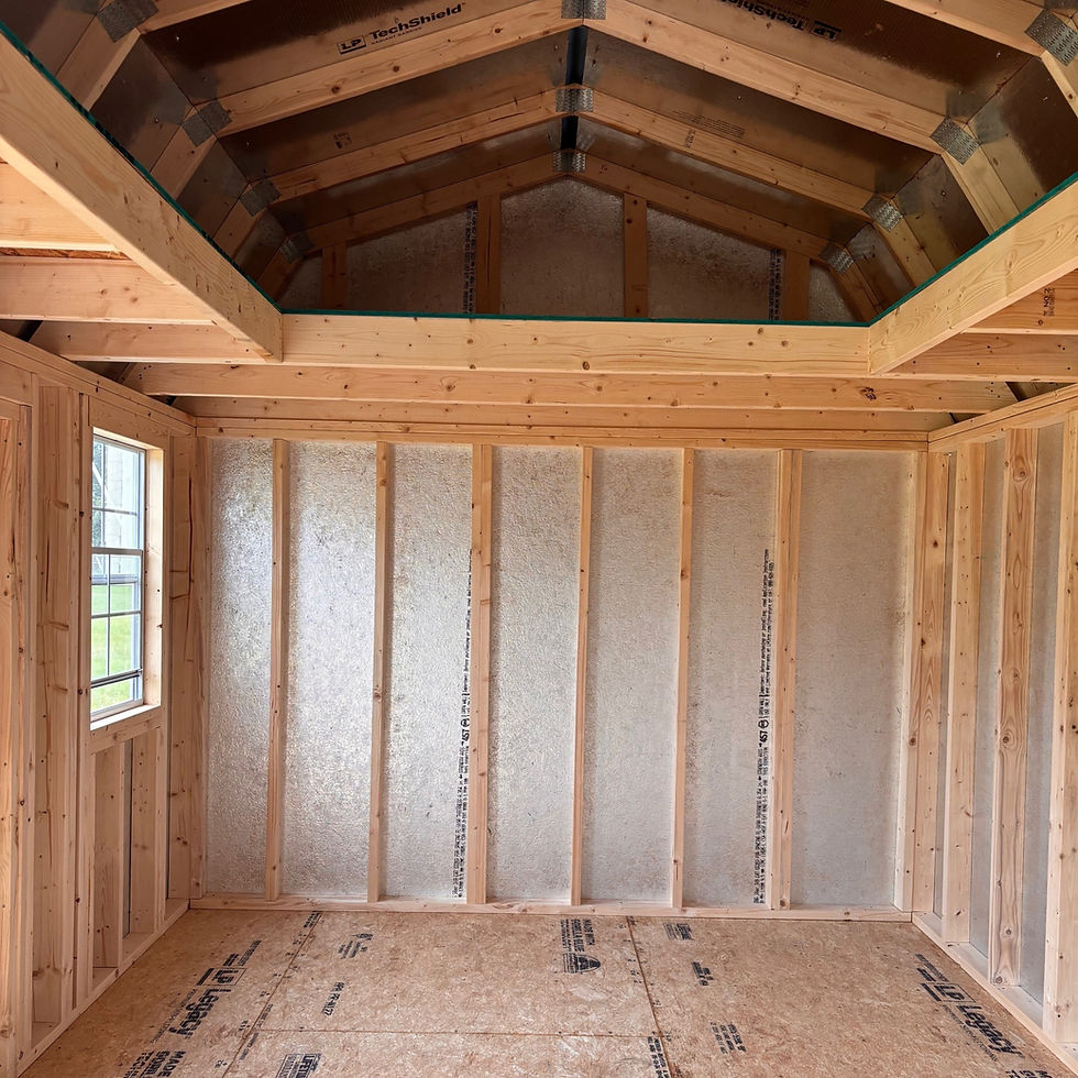 Thumbnail: Interior view of 10x16 shed showing wood framing, radiant barrier on walls, high loft, and durable OSB floor.