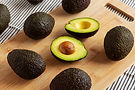 organic-raw-haas-avocados-on-a-wooden-board-side-2026-07-24-20-58-31-utc.jpg