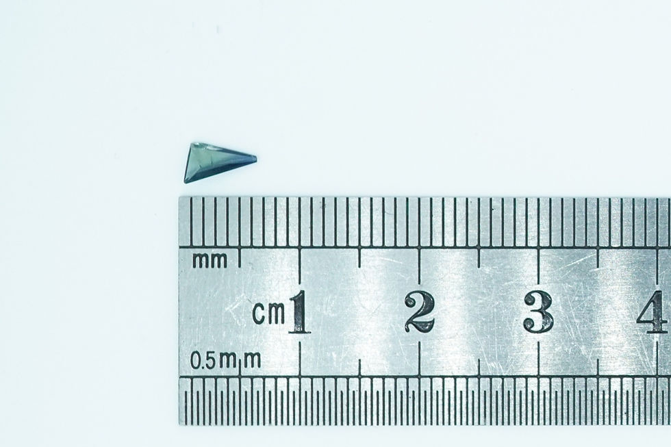 Thumbnail: Elongated Trillion Light Blue Rare Scottish Sapphire Gemstone