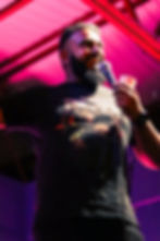 Smiling man holding microphone