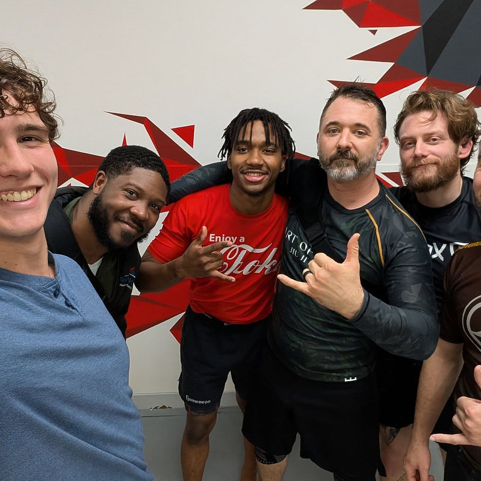 Adult Brazilian Jiu Jitsu teammates enjoying time together at Rise Up BJJ