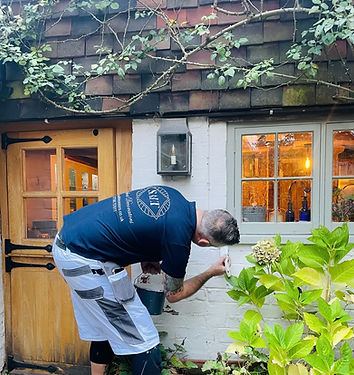 Salt Decorator painting outside wall