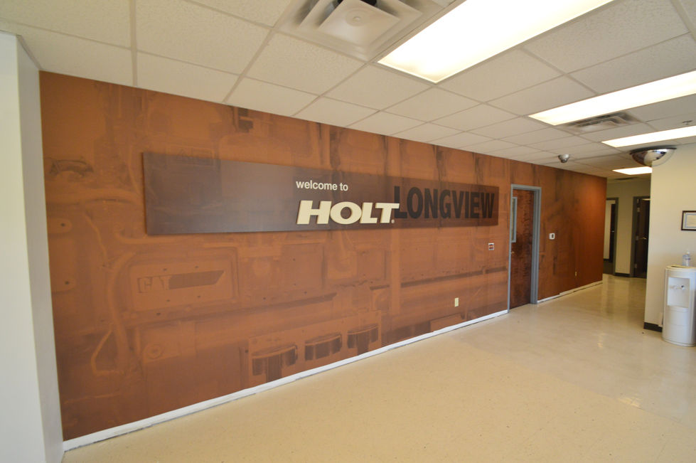 CAT CATERPILLAR SHOWROOM DESIGN SIGNAGE CUSTOMER EXPERIENCE