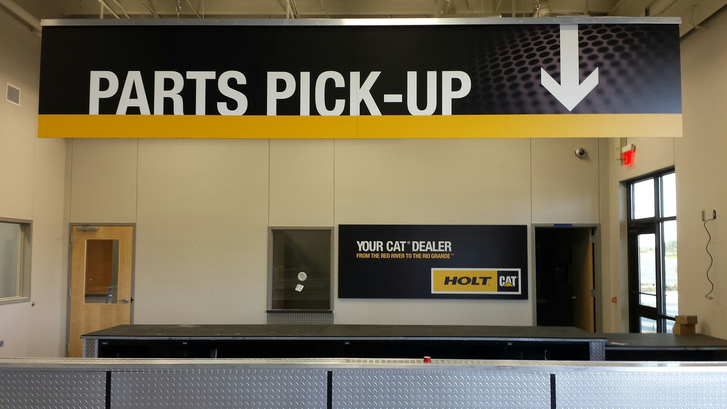 CAT CATERPILLAR SHOWROOM DESIGN SIGNAGE CUSTOMER EXPERIENCE
