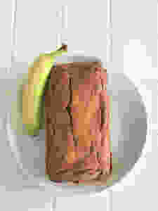 banana bread with banana on plate