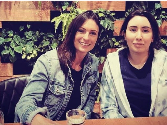 Latifa pictured with ex British police woman