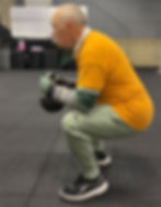 Kettlebell squats sumo style