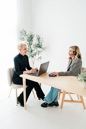 Molly Fini working with a client