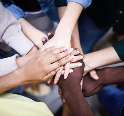 top-view-young-people-putting-their-hands-together.jpg