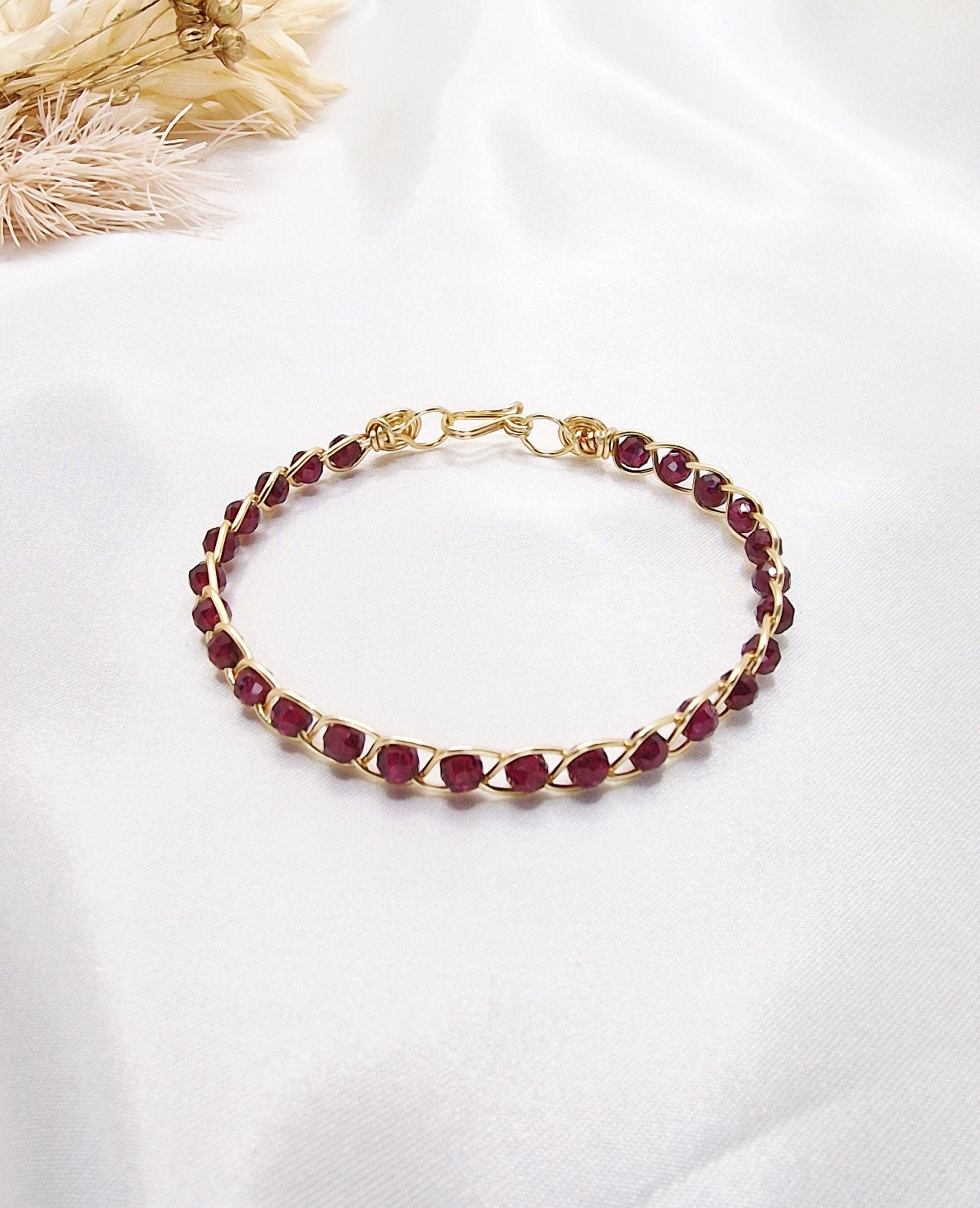 Bracelet Ignis doré perles rouges