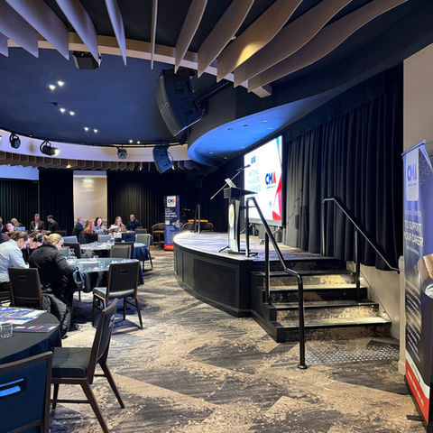 Keynote speaker Luke kennedy about to jump on stage to speak at CMAA conference in Sydney