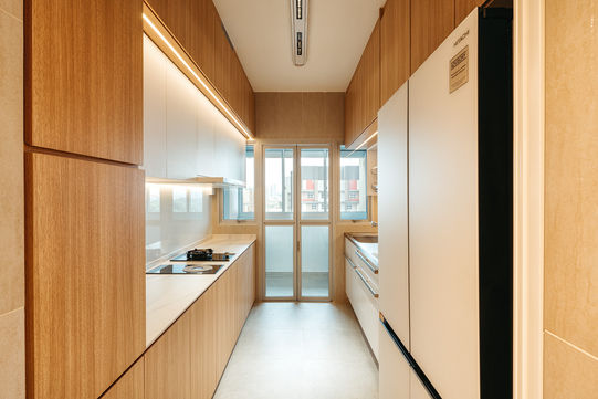 Serene Japandi-style interior at 133B Tengah Grange by ProjectGuru. A perfect fusion of Japanese minimalism and Scandinavian warmth, featuring natural wood tones, clean lines, and a tranquil ambiance.