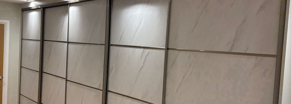 Luxury sliding wardrobe in Gerrards Cross by Bretton Carpentry