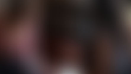 Two girls talking on the sofa