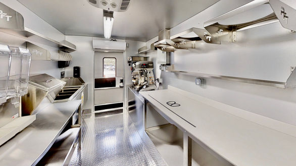 Exterior view of Auntie Anne's custom food truck in Tampa, Florida, showcasing the high-quality design by expert food truck builders.
