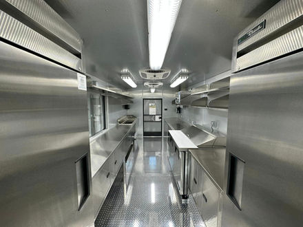 Premium True fridge and freezer installed in the custom food truck by Premier Food Trucks in Charlotte, North Carolina. A great option for those looking to buy a food truck.