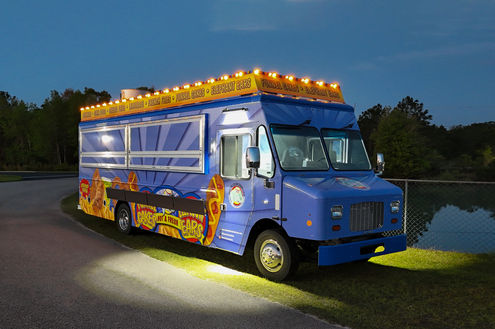 Festive bulbs installed on a custom-built festival food truck by Premier Food Trucks, perfect for those wanting to buy a food truck.