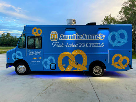Premier Food Trucks custom-built food truck for the renowned pretzel franchise, Auntie Anne's. Best food truck for sale.