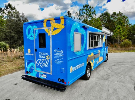 Rear view of Auntie Anne's food truck in Tampa, Florida, highlighting the secure and durable back door design, ideal for a custom food truck build.